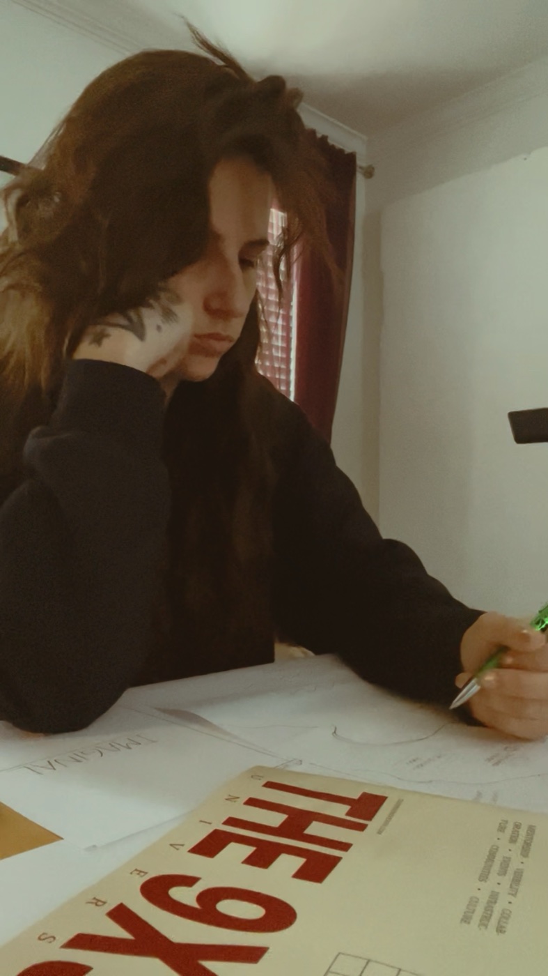 Vae Bataille drawing and developing the blueprint.